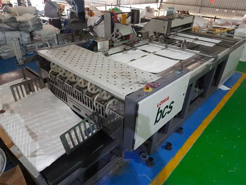 Laminated woven packaging bags for moisture protection